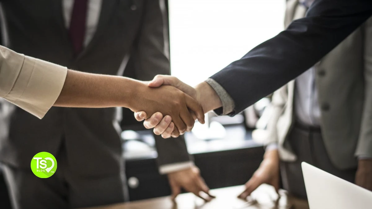 Business handshake illustrating the Marriott buys ILG deal