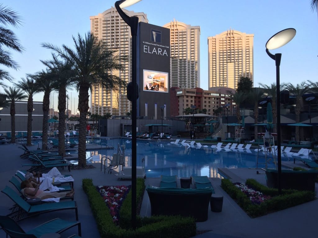 Pool deck at Elara, a Hilton timeshare Las Vegas resort