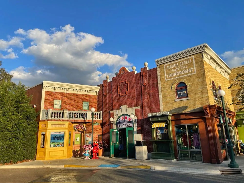 Elmo and Abby Cadabby greet guests on a Sesame Street themed streetscape at  SeaWorld.