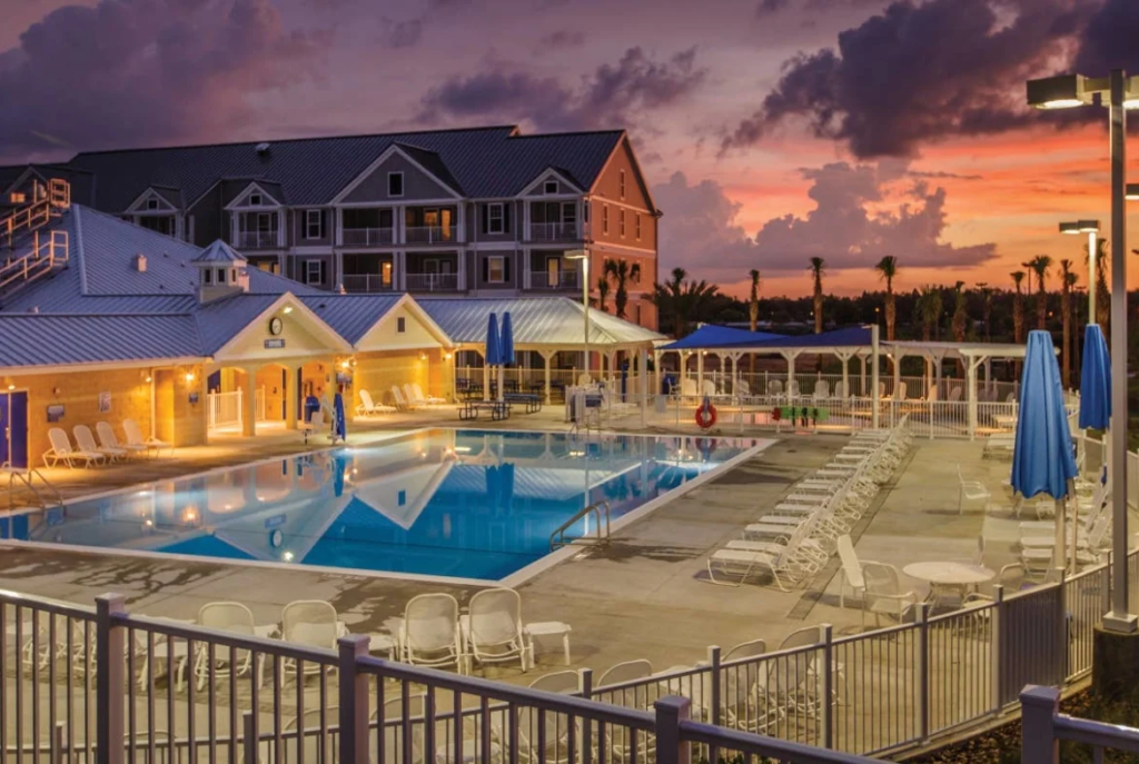 Pool and clubhouse at Orlando Breeze Resort near Orlando, Florida, the leading state in timeshare industry research