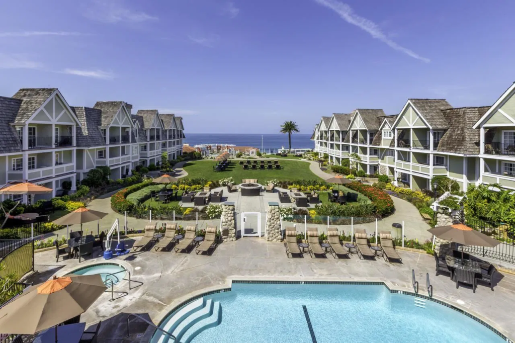 Aerial view of the pool courtyard and ocean at Carlsbad Inn Beach Resort in California, the No. 2 state by resort count in timeshare industry research