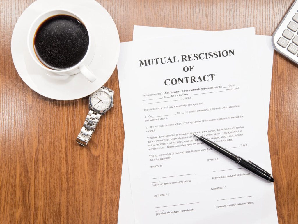 A mutual rescission of contract document on a desk, used to cancel and avoid timeshare maintenance fees.