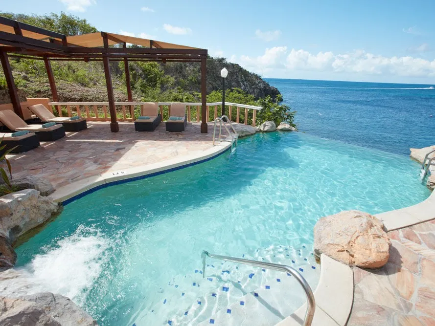 Tropical vacation rentals: infinity pool at Divi Little Bay Beach Resort, Sint Maarten