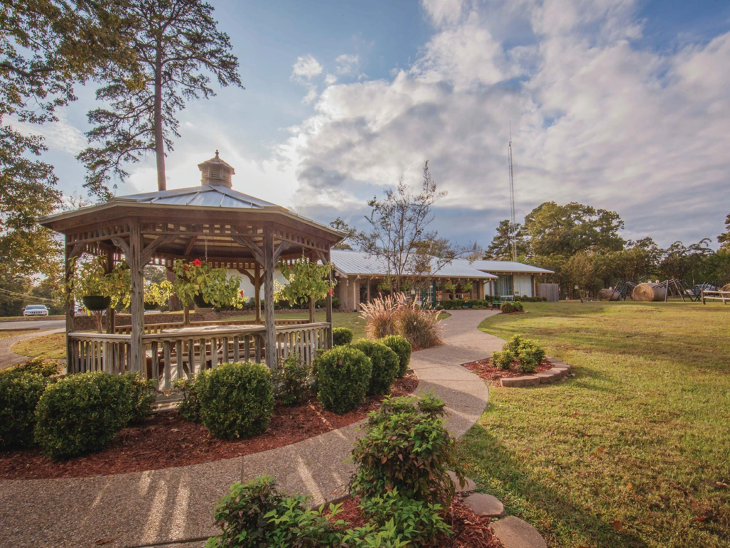 A scenic gazebo at Holly Lake Resort, a great spot for guests weighing the Pros and Cons of Holiday Inn Vacation Club.