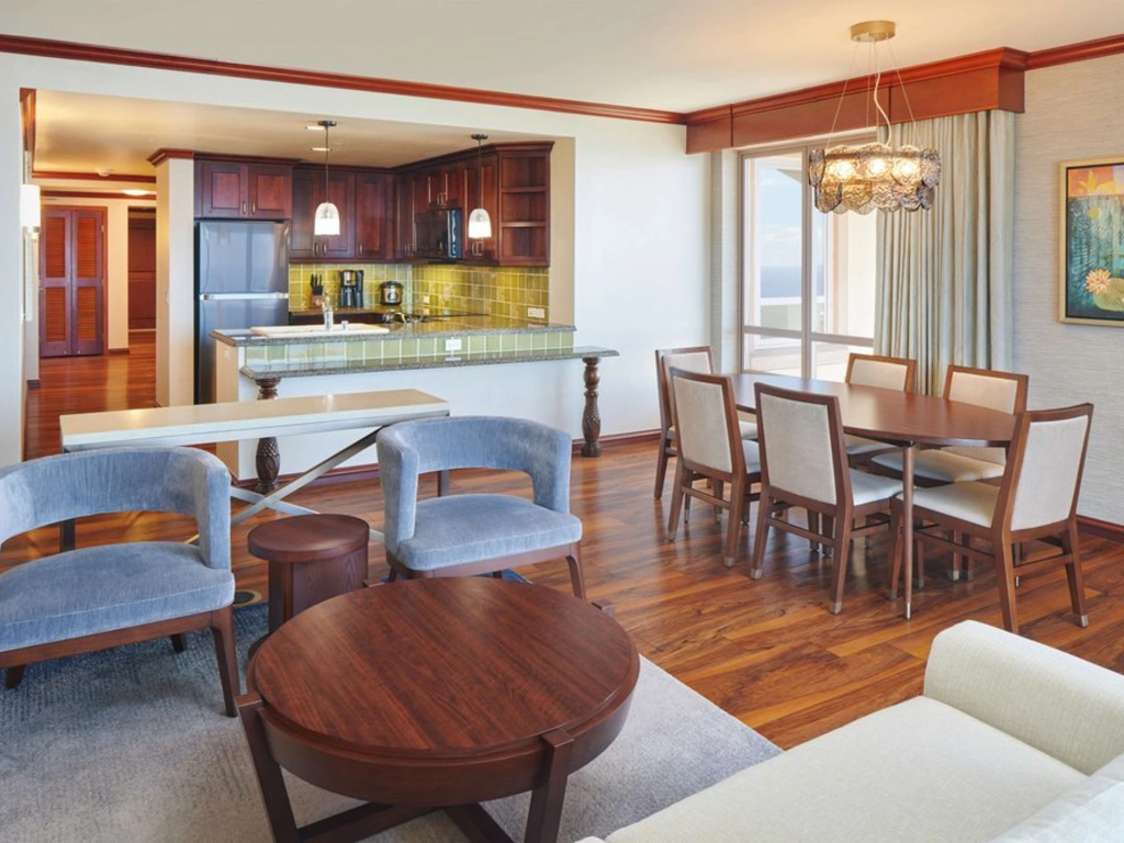 Modern living room and kitchen at Grand Waikikian. Is Hilton Grand Vacations Worth It?