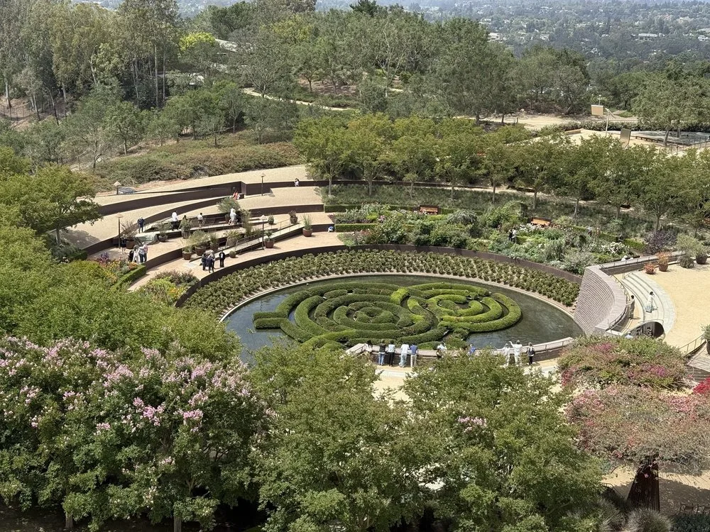 Aerial view of a kid friendly Los Angeles landmark: the Getty Center's circular hedge maze and terraced gardens.
