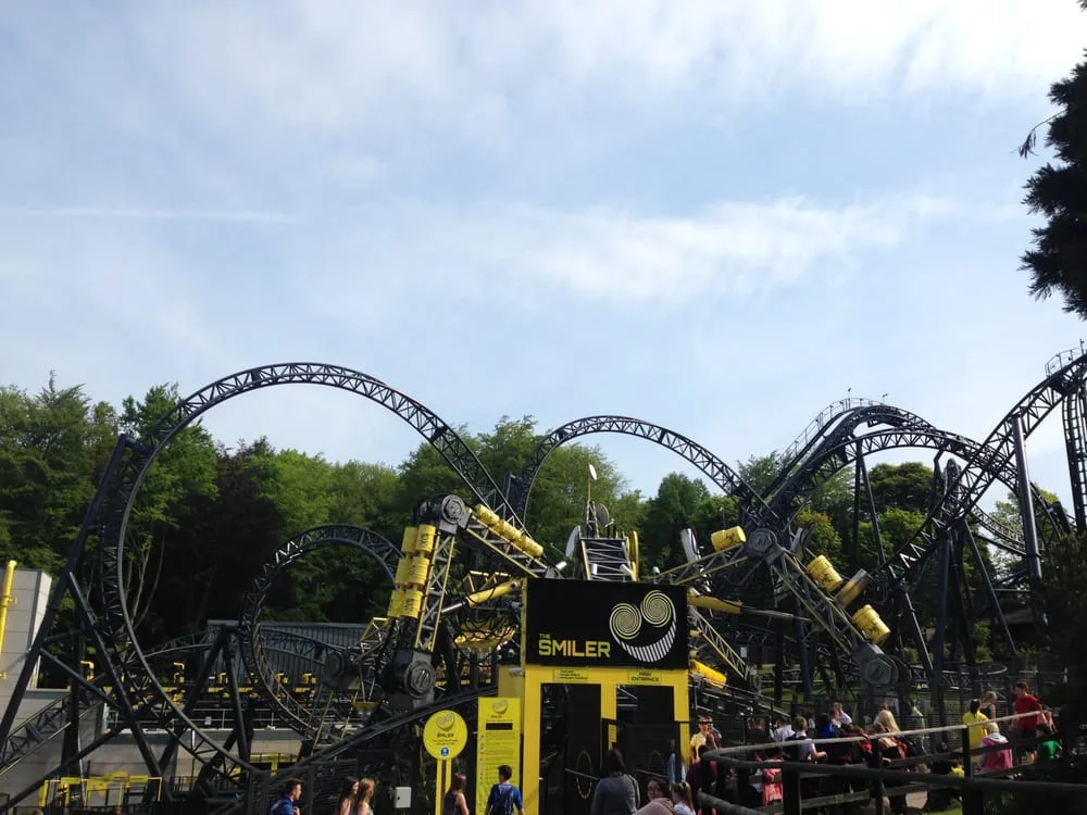 The Smiler’s multiple inversions against a blue sky at Alton Towers, one of the best theme parks in the world.