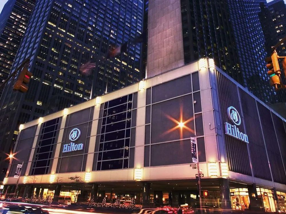New York Hilton Midtown at night, home to two of the timeshares New York City offers